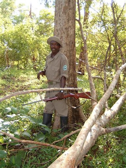 Biney James with Rifle